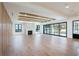 Light-filled living room with fireplace and sliding glass doors at 3305 W Beaumont St, Tampa, FL 33611