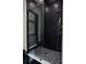 Modern bathroom with black and white hexagonal tile at 3305 W Beaumont St, Tampa, FL 33611