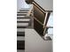 Modern staircase with sleek metal and wood accents at 3305 W Beaumont St, Tampa, FL 33611