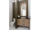 Modern powder room with dark green shiplap and floating vanity at 3305 W Beaumont St, Tampa, FL 33611