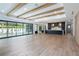 Spacious living room featuring hardwood floors and exposed beams at 3305 W Beaumont St, Tampa, FL 33611
