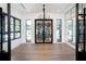 Elegant wine room with a large glass-front wine cellar at 3305 W Beaumont St, Tampa, FL 33611