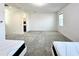 Spacious bedroom with en-suite bathroom and neutral decor at 32676 Tree Of Life Ave, Wesley Chapel, FL 33543