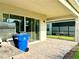Covered patio with pavers, providing ample space for outdoor entertaining at 32676 Tree Of Life Ave, Wesley Chapel, FL 33543