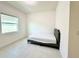 Well-lit bedroom with double bed and window at 32676 Tree Of Life Ave, Wesley Chapel, FL 33543