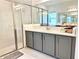 Modern bathroom with double vanity, large shower, and updated fixtures at 32676 Tree Of Life Ave, Wesley Chapel, FL 33543
