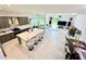 Open concept kitchen with island and breakfast bar at 32676 Tree Of Life Ave, Wesley Chapel, FL 33543