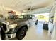 Attached garage with space for car and storage at 32676 Tree Of Life Ave, Wesley Chapel, FL 33543