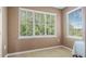Small room with window and tile flooring at 18001 Richmond Place Dr # 1122, Tampa, FL 33647