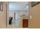 Entryway with view into living room and kitchen at 18001 Richmond Place Dr # 1122, Tampa, FL 33647
