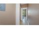 Hallway with access to bedrooms and closet space at 18001 Richmond Place Dr # 1122, Tampa, FL 33647
