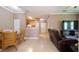 Open living and dining area with recessed lighting and tiled floors at 18001 Richmond Place Dr # 1122, Tampa, FL 33647