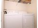 Laundry closet with washer and dryer at 18001 Richmond Place Dr # 1122, Tampa, FL 33647