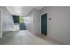 Interior hallway with stairs and apartment entrance at 18001 Richmond Place Dr # 1122, Tampa, FL 33647