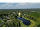 Aerial view showing home's location on a lakefront property at 20605 Preston Ln, Lutz, FL 33558
