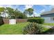 Fenced backyard with storage shed and beautiful landscaping at 20605 Preston Ln, Lutz, FL 33558