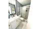 Clean bathroom with modern vanity and shower at 7634 Cortez Ct, Tampa, FL 33615