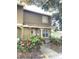 Attractive two-story townhome with landscaping and walkway at 7634 Cortez Ct, Tampa, FL 33615