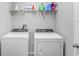 Convenient laundry room with washer and dryer at 5472 Summer Sunset Dr, Apollo Beach, FL 33572