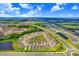 Wide shot of a residential neighborhood with a focus on the subject property at 5472 Summer Sunset Dr, Apollo Beach, FL 33572