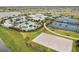 Expansive pool area with a clubhouse, volleyball court and tennis courts at 5472 Summer Sunset Dr, Apollo Beach, FL 33572
