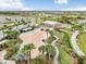 Community spray park with shaded seating and playground nearby at 5472 Summer Sunset Dr, Apollo Beach, FL 33572