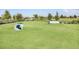 Dog park with tunnels and open green space at 5472 Summer Sunset Dr, Apollo Beach, FL 33572