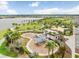 playground with play structures and shaded seating at 5472 Summer Sunset Dr, Apollo Beach, FL 33572