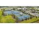 Community tennis and pickleball courts with modern amenities at 5472 Summer Sunset Dr, Apollo Beach, FL 33572