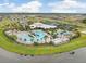 Resort-style pool and expansive clubhouse with various amenities at 5472 Summer Sunset Dr, Apollo Beach, FL 33572