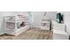 bedroom with bunk beds and built-in shelving at 5472 Summer Sunset Dr, Apollo Beach, FL 33572