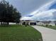 House exterior with driveway and landscaping at 6114 Nantucket Ln, Spring Hill, FL 34608