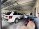 Garage with overhead door and ample space for a vehicle at 6114 Nantucket Ln, Spring Hill, FL 34608