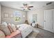 Charming bedroom featuring a twin bed and decorative wall art at 31417 Sun Kettle Loop, Wesley Chapel, FL 33545