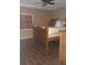 Bedroom with wooden bed frame and tiled floors at 9920 Eagles Point Cir # 2, Port Richey, FL 34668
