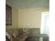 Living Room with sectional sofa and coffee table at 9920 Eagles Point Cir # 2, Port Richey, FL 34668