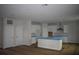 Bright, open kitchen with modern appliances, island, and storage for cooking and entertaining at 3204 N Morgan St, Tampa, FL 33603