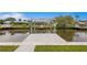 Private boat dock with lift and canal views at 8716 Elmwood Ln, Tampa, FL 33615