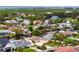 Bird's-eye view of a waterfront community with various house styles at 8716 Elmwood Ln, Tampa, FL 33615