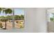 Bedroom with large window overlooking the street at 210 E Janette Ave, Tampa, FL 33603