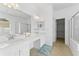 Double vanity bathroom with a soaking tub and walk-in shower at 19148 Dove Creek Dr, Tampa, FL 33647