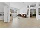 Spacious living room with tile floors and ample natural light at 19148 Dove Creek Dr, Tampa, FL 33647
