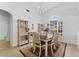 Elegant dining room featuring a rustic table and decorative accents at 19148 Dove Creek Dr, Tampa, FL 33647