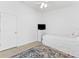Bright bedroom with a twin bed and access to another room at 19148 Dove Creek Dr, Tampa, FL 33647