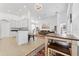 Kitchen with white cabinets, a breakfast bar, and tile floors at 19148 Dove Creek Dr, Tampa, FL 33647