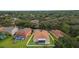 Aerial view showcasing a house with a pool in a residential area at 19148 Dove Creek Dr, Tampa, FL 33647