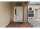 Inviting front entrance with a white door and a brick walkway at 19148 Dove Creek Dr, Tampa, FL 33647
