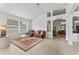 Relaxing living room featuring a large window and comfortable seating at 19148 Dove Creek Dr, Tampa, FL 33647