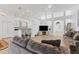Open concept living room with kitchen and dining area views at 19148 Dove Creek Dr, Tampa, FL 33647