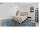 Main bedroom with ensuite bathroom access, and ceiling fan at 19148 Dove Creek Dr, Tampa, FL 33647